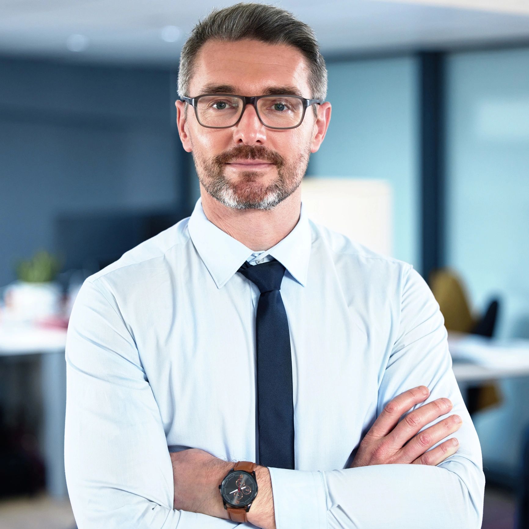 Executive portrait representing community alignment and leadership