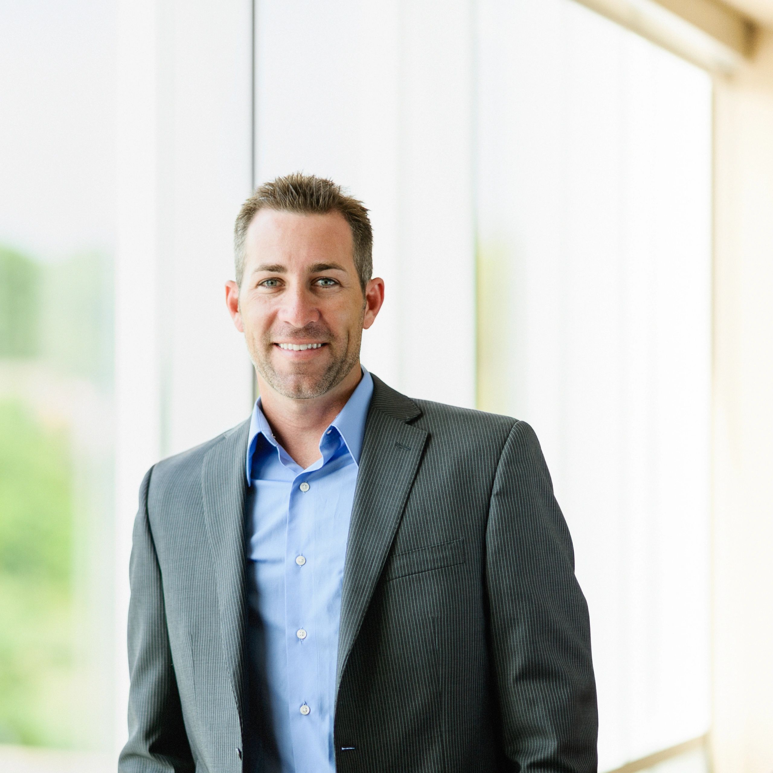 Professional business portrait representing strategic leadership